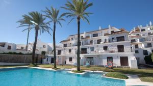 Bazén v ubytování Marina Real 232 nebo v jeho okolí