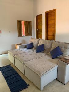 Et opholdsområde på Casa e Chalé raio de sol + 12 billeder