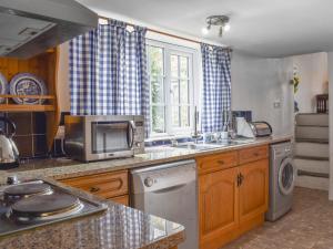 Kuchyň nebo kuchyňský kout v ubytování Nutmeg's - Uk50373