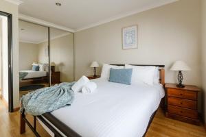 Katil atau katil-katil dalam bilik di Purple Shore Spacious Family Stay Near Busselton Jetty