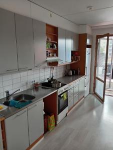 Η κουζίνα ή μικρή κουζίνα στο Private room in shared appartment