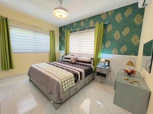 Ένα ή περισσότερα κρεβάτια σε δωμάτιο στο Cozy villa in Punta Cana +17 φωτογραφίες