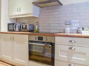 Kuchyň nebo kuchyňský kout v ubytování The Brew House + 17 fotografií