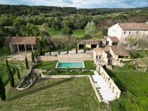an aerial view of an estate with a swimming pool at Historic Mansion In Provence Vineyards in La Tour-dʼAigues