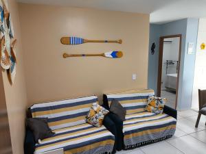 Ένα ή περισσότερα κρεβάτια σε δωμάτιο στο Lindo Apartamento em João pessoa com ar condicionado