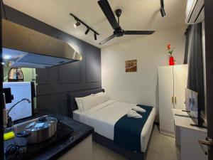 Ένα ή περισσότερα κρεβάτια σε δωμάτιο στο Neu Suites Junior Suite By Serenity Homes Next to Gleneagles & LRT +213 φωτογραφίες