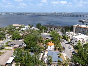 an aerial view of a city with a body of water at The Hideaways at Point Pleasant - Palm Side in Bradenton +10 photos
