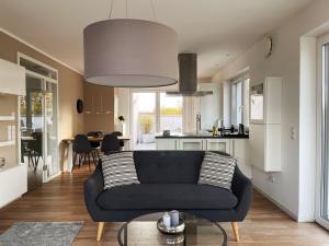 Posezení v ubytování Modernes Apartment über den Dächern von Osnabrück I home2share