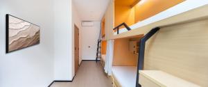 Η κουζίνα ή μικρή κουζίνα στο Guangzhou Xingdu International Youth Hotel Apartment