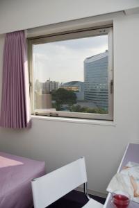 Postel nebo postele na pokoji v ubytování Nesthotel Alt Meguro Ekimae