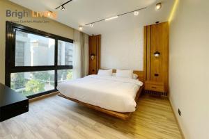 Postel nebo postele na pokoji v ubytování Ultra Luxury 3BR Brand New Green oriented compound