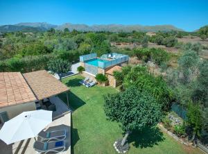 an aerial view of a house with a yard at Owl Booking Villa Rafale - 5 Min Drive to The Beach in El Port