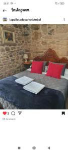 Postel nebo postele na pokoji v ubytování La pallota de san cristobal