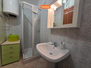 Koupelna v ubytování Cavaliere - By Ligooria + 17 fotografií