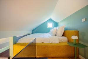 Ένα ή περισσότερα κρεβάτια σε δωμάτιο στο ODA Boutique Hotel