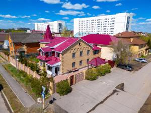 an overhead view of a building with a red roof at Er Targyn 19 in Astana