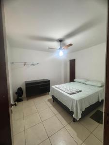 En eller flere senge i et værelse på Quarto Suite