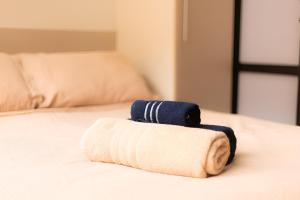 Postel nebo postele na pokoji v ubytování SUH Copacabana 123 Perfect Studio