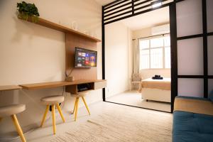 Postel nebo postele na pokoji v ubytování SUH Copacabana 123 Perfect Studio