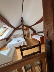 Ένα ή περισσότερα κρεβάτια σε δωμάτιο στο Auberge Cherisy