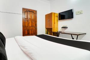 Μια τηλεόραση ή/και κέντρο ψυχαγωγίας στο FabExpress Peaceful Studio AAI Bungalow