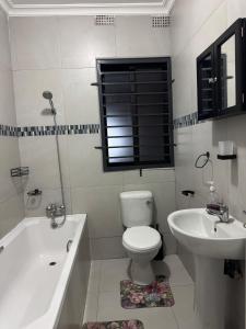 Koupelna v ubytování Mutesu Apartments + 3 fotografie