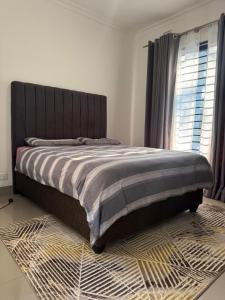 Postel nebo postele na pokoji v ubytování Mutesu Apartments