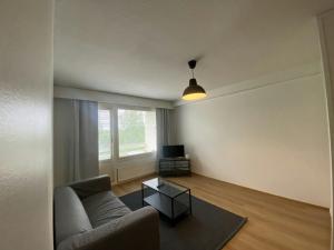 Et opholdsområde på Spacious Apartment for 4 with Sauna