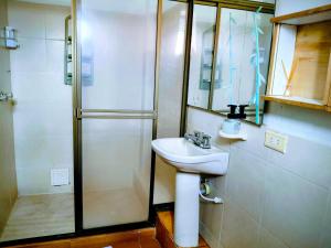 a bathroom with a sink and a shower at La tranquera hotel in Villa de Leyva +39 photos