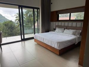 Katil atau katil-katil dalam bilik di GINGY Holidays