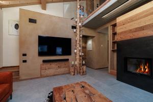 Μια τηλεόραση ή/και κέντρο ψυχαγωγίας στο Sylva Smart Lodge