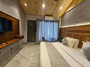 Ένα ή περισσότερα κρεβάτια σε δωμάτιο στο Horizon Edge Resort