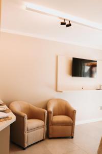 Μια τηλεόραση ή/και κέντρο ψυχαγωγίας στο Alma do Vale Hospedaria