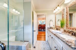 a bathroom with two sinks and a shower at Peaceful Home with Porch and Yard, 5 Mi to Rome! in Rome +16 photos