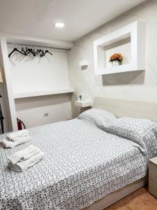 Ένα ή περισσότερα κρεβάτια σε δωμάτιο στο Ciro E Lucia +3 φωτογραφίες