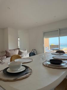 Posezení v ubytování Appartement face à la mer 2