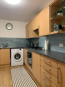 Η κουζίνα ή μικρή κουζίνα στο Santana Apartments Brighton