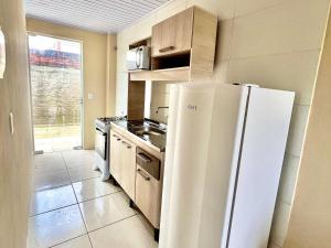 Η κουζίνα ή μικρή κουζίνα στο Residencial Villa Del Mare