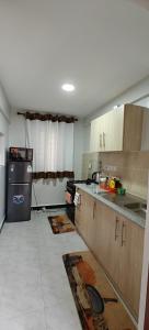 a kitchen that is being remodeled with a counter top at Perfect palm Condos-Kings Sapphire in Nakuru