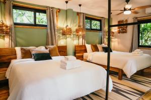 Cama ou camas em um quarto em Palmar Beach Lodge mais 36 fotos