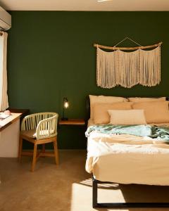 Postel nebo postele na pokoji v ubytování Pelicano Popoyo