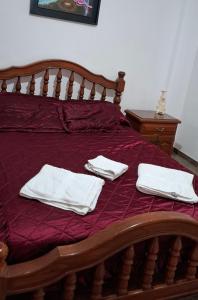 Ένα ή περισσότερα κρεβάτια σε δωμάτιο στο MKM Departamento 1