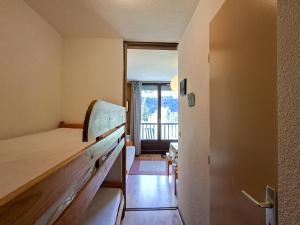 Postel nebo postele na pokoji v ubytování Studio confortable avec balcon au centre de Flaine - FR-1-425-174