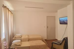 Μια τηλεόραση ή/και κέντρο ψυχαγωγίας στο Família Costa-Studio Marie Curie (Inatel)