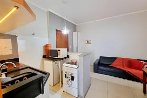 Кухня или мини-кухня в Família Costa-Apê no centro
