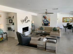a living room with a couch and a table at USS San Lorenzo in Palm Springs