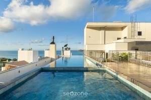 Kolam renang di atau dekat dengan Studio c/ churrasqueira a 220m da Praia SFR0302