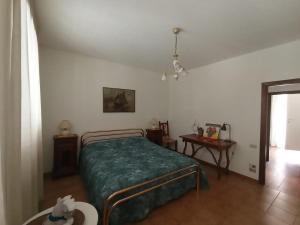 Postel nebo postele na pokoji v ubytování Casa a dieci minuti dal mare