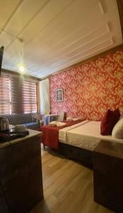 Postel nebo postele na pokoji v ubytování Butik otel