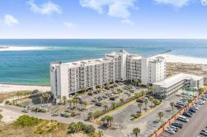 an aerial view of a hotel on the beach at Grand Pointe Unit 706 in Orange Beach